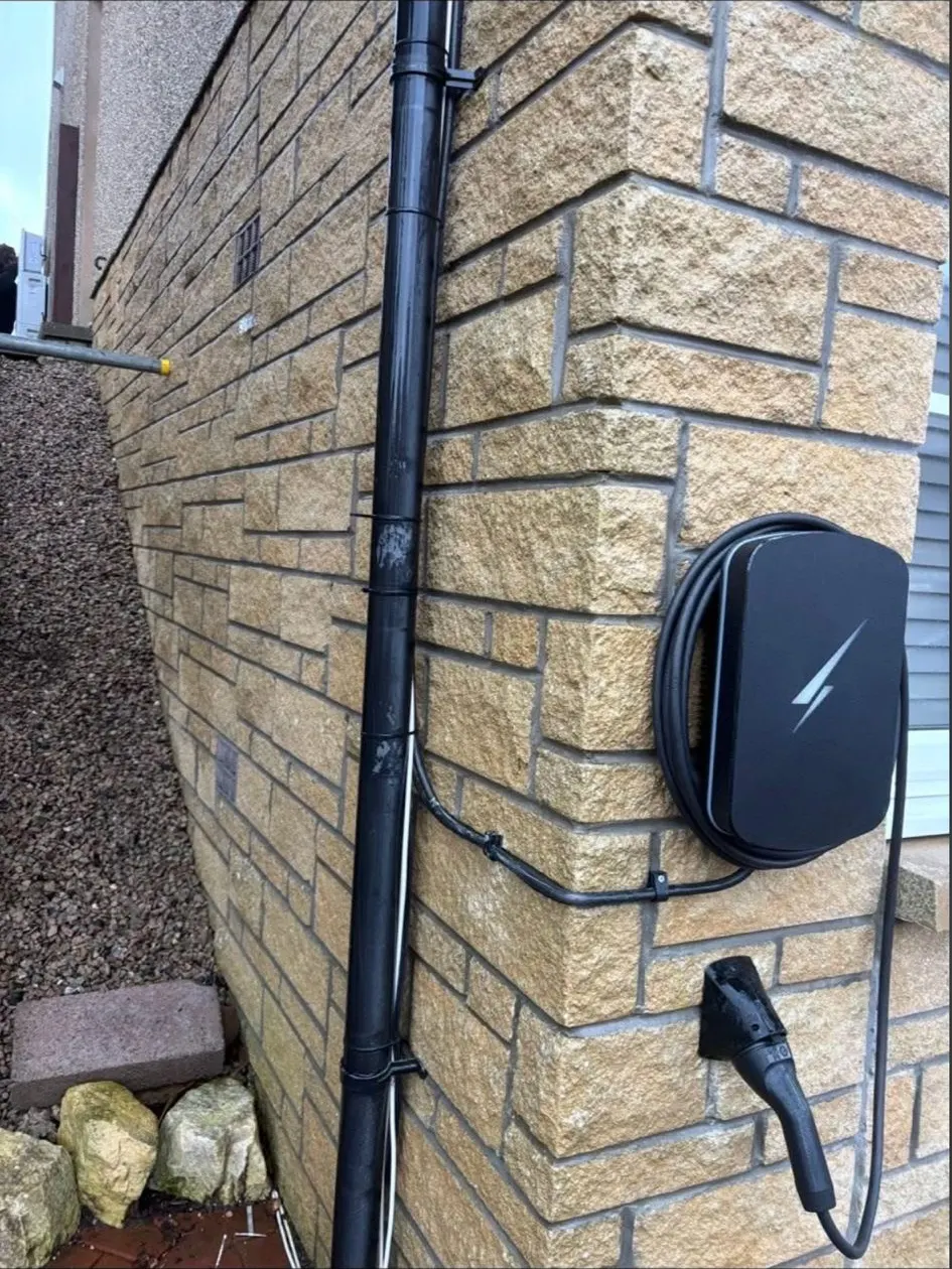 EV charger mounted on a sandstone corner