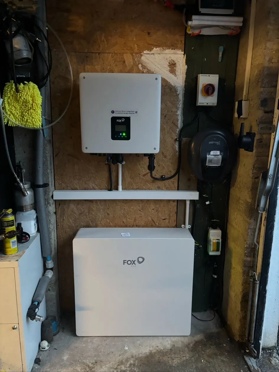 FoxESS inverter and battery beside a Pod Point charger