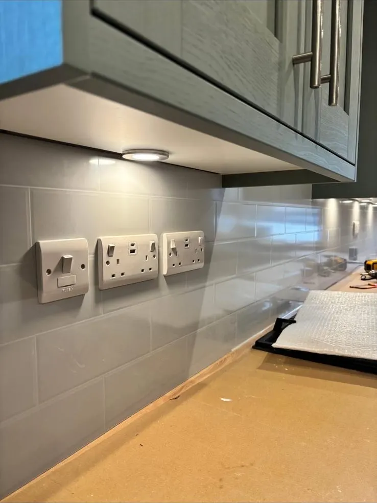 Under-cabinet lighting and new kitchen sockets