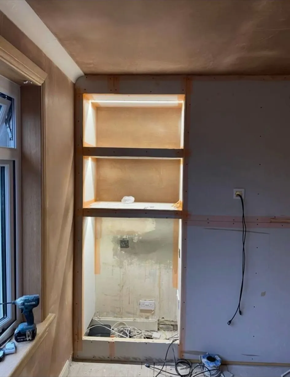 LED strip lighting in alcove shelving