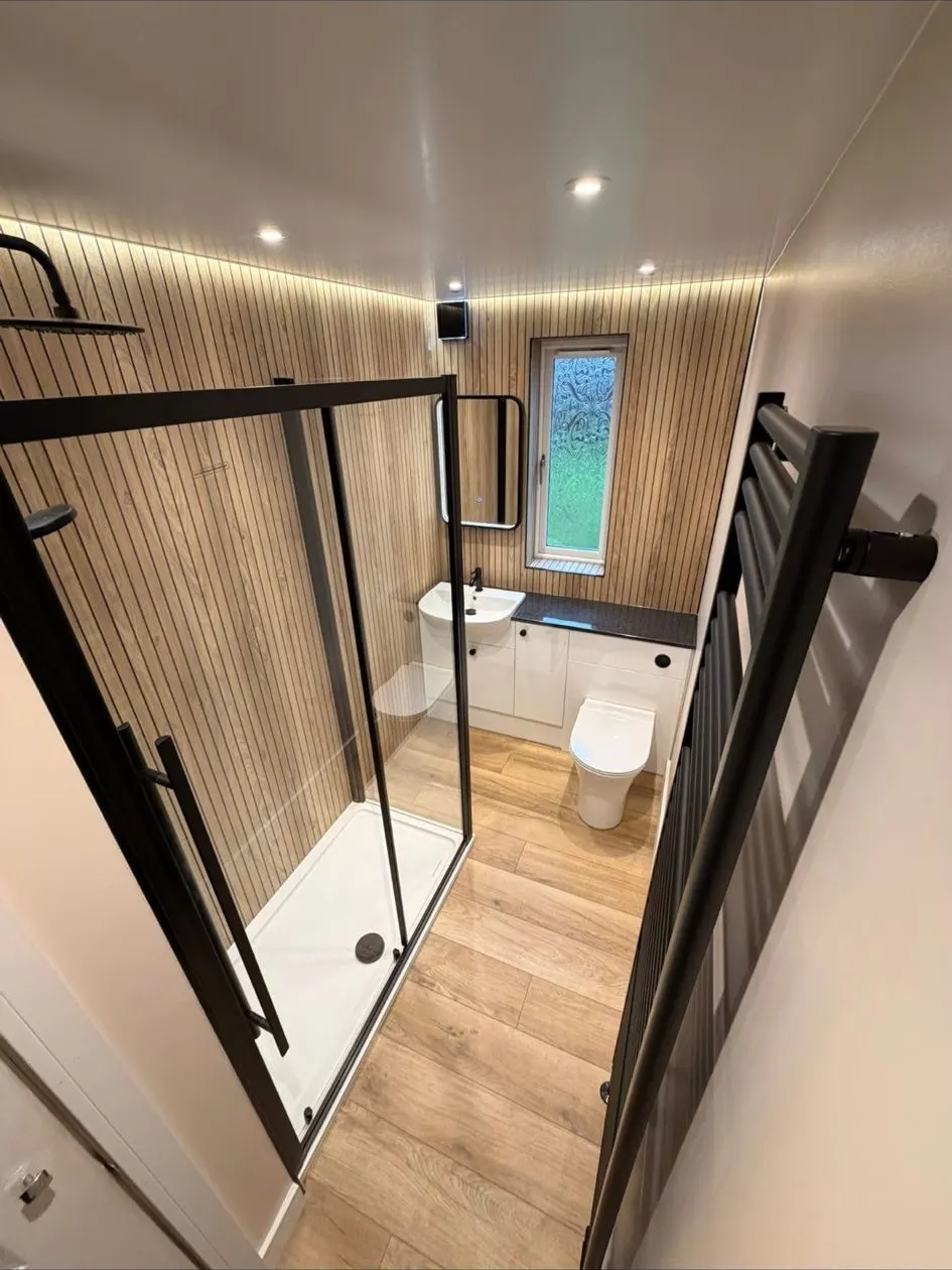 Shower room downlights and cove lighting